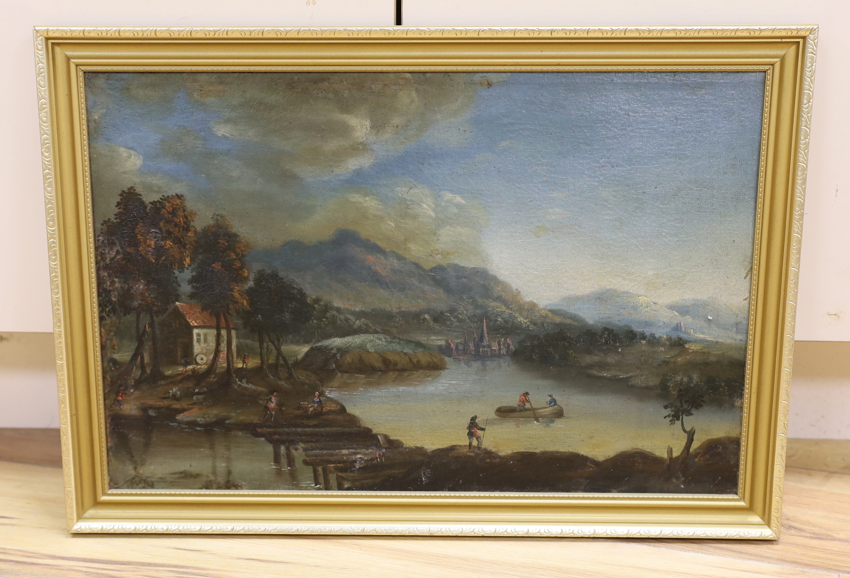19th century School, oil on canvas, Continental river landscape with bridge and figures, 34 x 53cm
